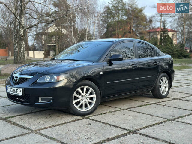 Чорний Мазда 3, об'ємом двигуна 1.6 л та пробігом 198 тис. км за 5499 $, фото 3 на Automoto.ua
