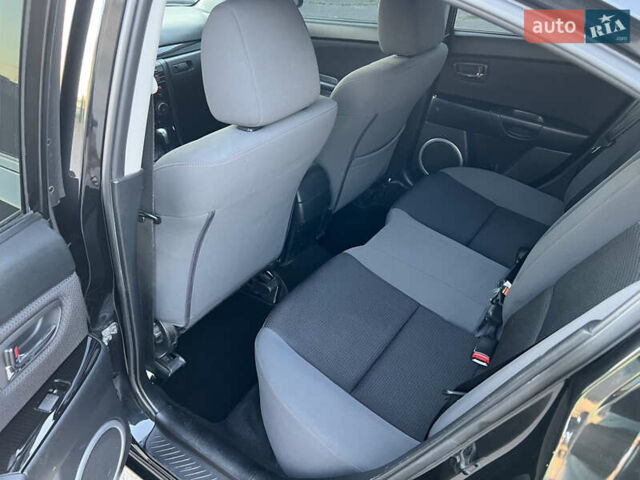 Чорний Мазда 3, об'ємом двигуна 2 л та пробігом 167 тис. км за 7500 $, фото 10 на Automoto.ua