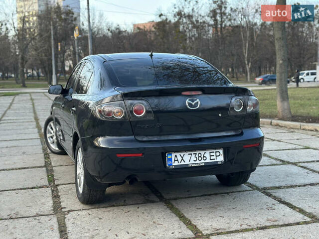 Чорний Мазда 3, об'ємом двигуна 1.6 л та пробігом 198 тис. км за 5499 $, фото 17 на Automoto.ua