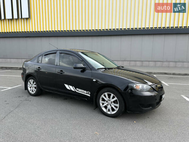 Черный Мазда 3, объемом двигателя 2 л и пробегом 200 тыс. км за 2700 $, фото 5 на Automoto.ua