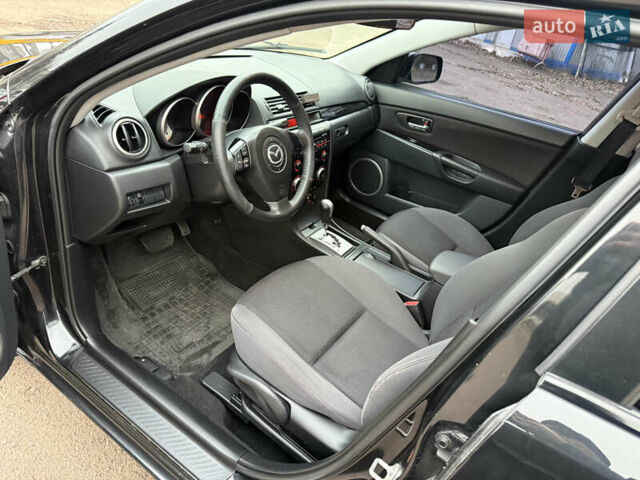 Чорний Мазда 3, об'ємом двигуна 1.6 л та пробігом 183 тис. км за 6150 $, фото 34 на Automoto.ua