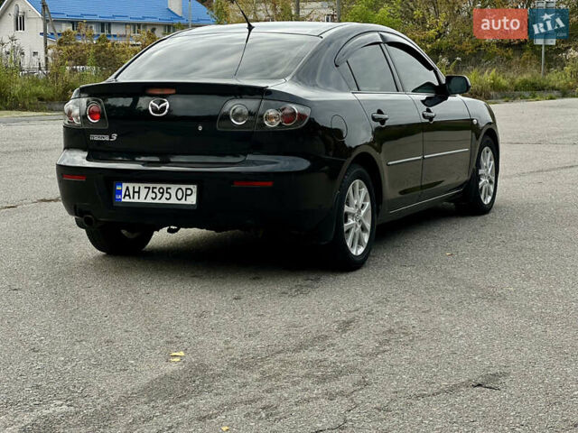 Черный Мазда 3, объемом двигателя 1.6 л и пробегом 158 тыс. км за 6200 $, фото 10 на Automoto.ua