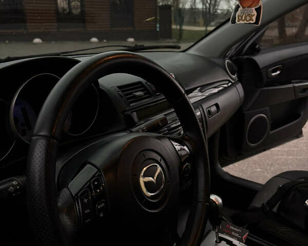 Чорний Мазда 3, об'ємом двигуна 1.6 л та пробігом 330 тис. км за 5500 $, фото 15 на Automoto.ua