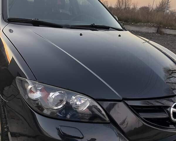 Черный Мазда 3, объемом двигателя 1.6 л и пробегом 153 тыс. км за 6200 $, фото 18 на Automoto.ua