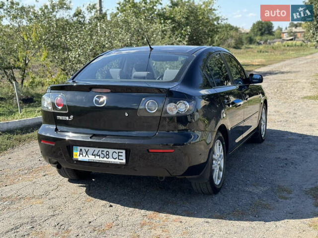 Чорний Мазда 3, об'ємом двигуна 1.6 л та пробігом 160 тис. км за 5999 $, фото 5 на Automoto.ua