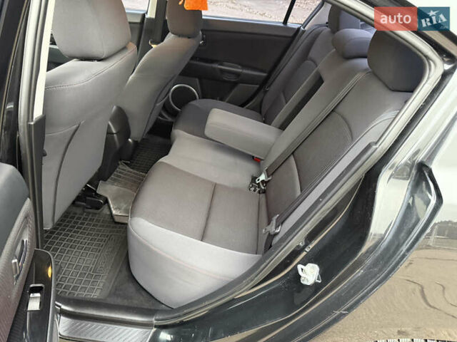 Чорний Мазда 3, об'ємом двигуна 1.6 л та пробігом 183 тис. км за 6150 $, фото 35 на Automoto.ua
