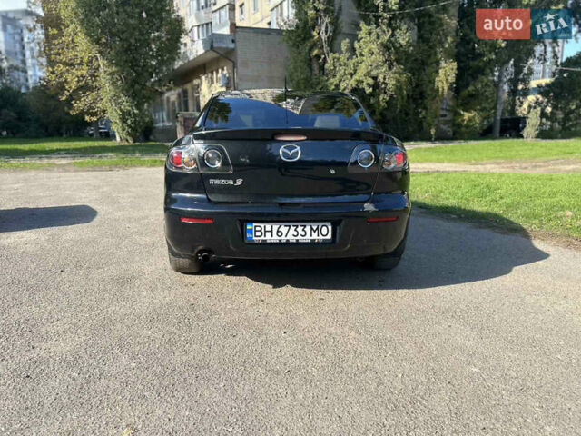 Черный Мазда 3, объемом двигателя 1.6 л и пробегом 153 тыс. км за 5500 $, фото 9 на Automoto.ua