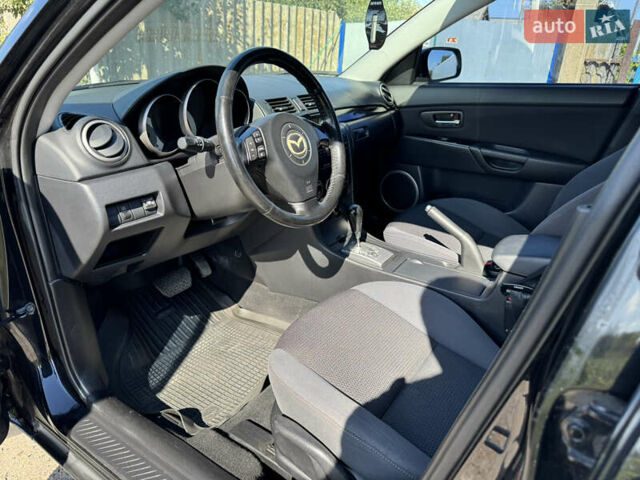 Чорний Мазда 3, об'ємом двигуна 1.6 л та пробігом 160 тис. км за 5999 $, фото 11 на Automoto.ua