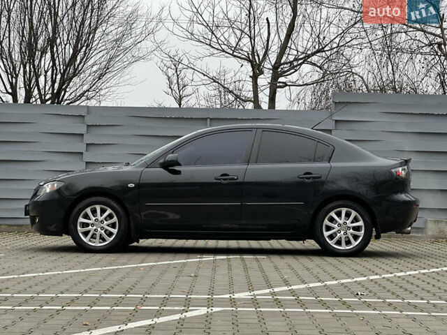 Черный Мазда 3, объемом двигателя 1.6 л и пробегом 256 тыс. км за 5450 $, фото 7 на Automoto.ua