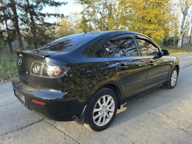 Черный Мазда 3, объемом двигателя 2 л и пробегом 192 тыс. км за 6500 $, фото 4 на Automoto.ua