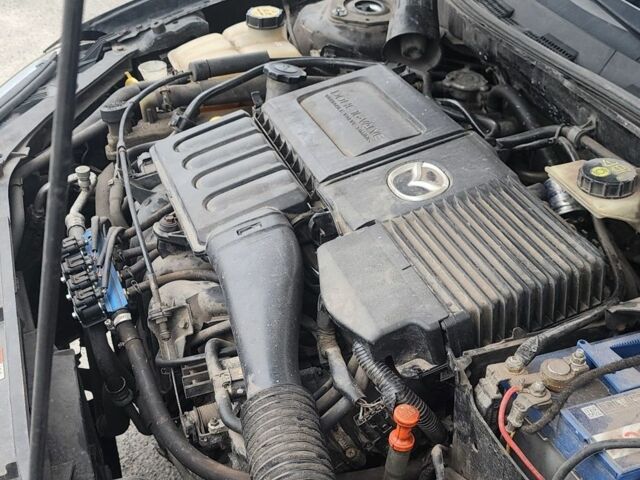 Черный Мазда 3, объемом двигателя 1.6 л и пробегом 300 тыс. км за 3700 $, фото 22 на Automoto.ua