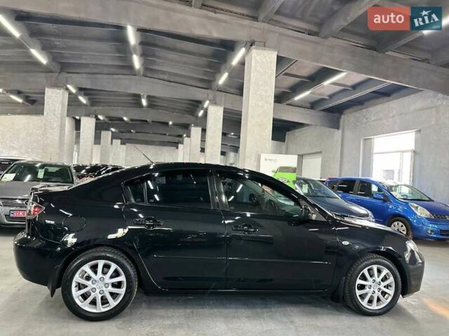 Чорний Мазда 3, об'ємом двигуна 2 л та пробігом 199 тис. км за 7299 $, фото 7 на Automoto.ua