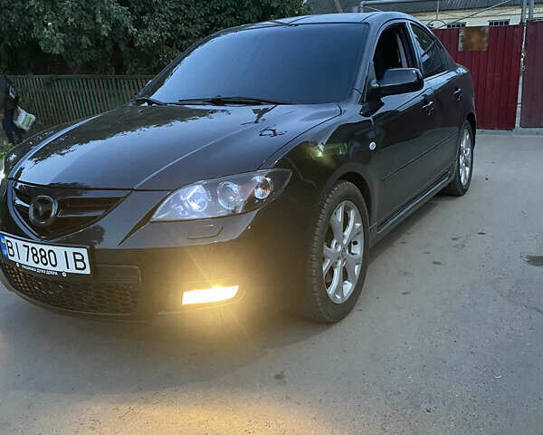 Черный Мазда 3, объемом двигателя 2 л и пробегом 204 тыс. км за 6700 $, фото 5 на Automoto.ua