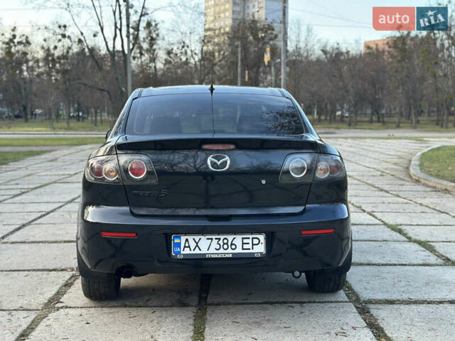 Чорний Мазда 3, об'ємом двигуна 1.6 л та пробігом 198 тис. км за 5499 $, фото 21 на Automoto.ua