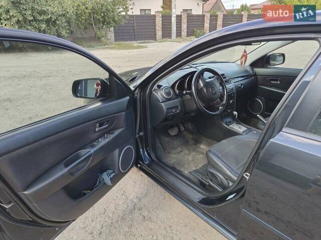 Чорний Мазда 3, об'ємом двигуна 1.6 л та пробігом 208 тис. км за 5500 $, фото 14 на Automoto.ua