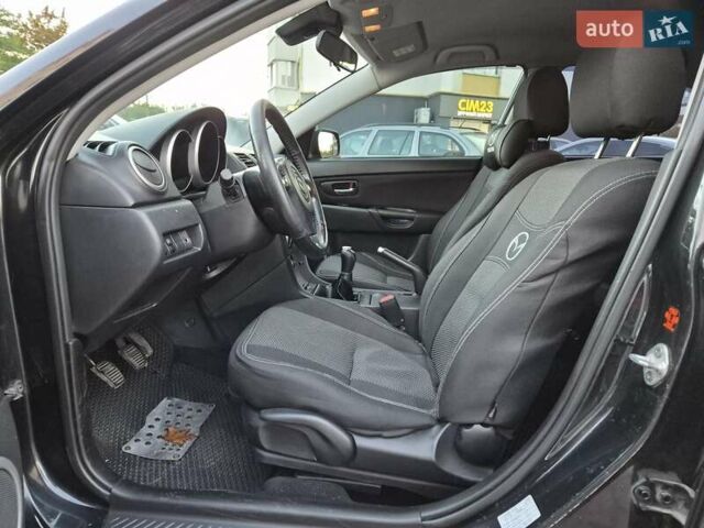 Чорний Мазда 3, об'ємом двигуна 1.6 л та пробігом 253 тис. км за 5200 $, фото 35 на Automoto.ua