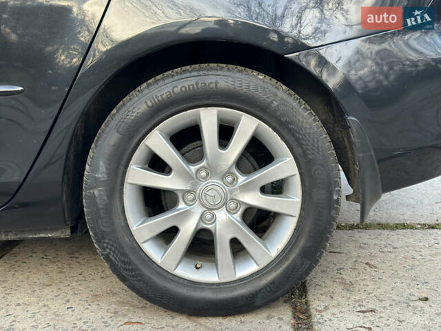 Чорний Мазда 3, об'ємом двигуна 1.6 л та пробігом 198 тис. км за 5499 $, фото 24 на Automoto.ua