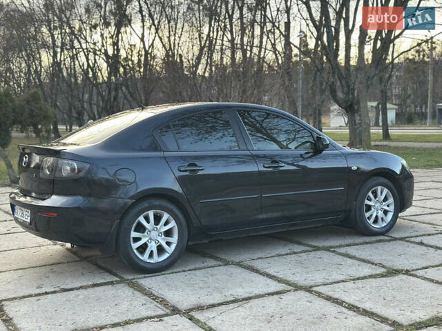 Чорний Мазда 3, об'ємом двигуна 1.6 л та пробігом 198 тис. км за 5499 $, фото 11 на Automoto.ua
