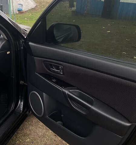 Черный Мазда 3, объемом двигателя 2 л и пробегом 182 тыс. км за 5500 $, фото 15 на Automoto.ua