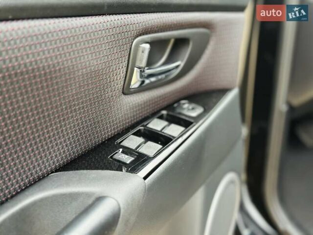 Черный Мазда 3, объемом двигателя 1.6 л и пробегом 130 тыс. км за 7700 $, фото 39 на Automoto.ua