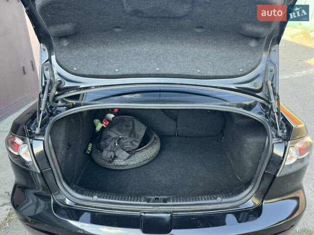 Чорний Мазда 3, об'ємом двигуна 2 л та пробігом 167 тис. км за 7500 $, фото 18 на Automoto.ua