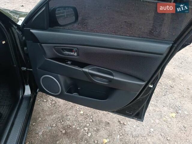 Черный Мазда 3, объемом двигателя 2 л и пробегом 221 тыс. км за 5700 $, фото 23 на Automoto.ua