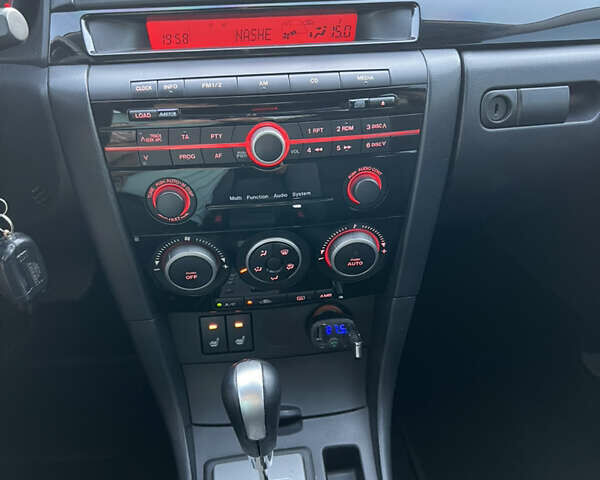 Чорний Мазда 3, об'ємом двигуна 2 л та пробігом 167 тис. км за 7500 $, фото 15 на Automoto.ua