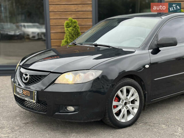 Чорний Мазда 3, об'ємом двигуна 1.6 л та пробігом 223 тис. км за 5450 $, фото 3 на Automoto.ua