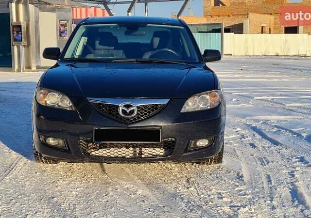 Черный Мазда 3, объемом двигателя 2 л и пробегом 255 тыс. км за 5000 $, фото 4 на Automoto.ua
