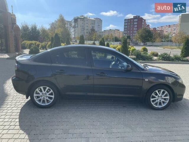 Черный Мазда 3, объемом двигателя 2 л и пробегом 175 тыс. км за 6000 $, фото 7 на Automoto.ua