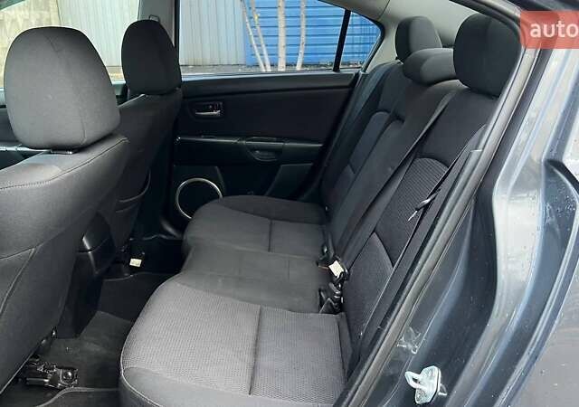 Черный Мазда 3, объемом двигателя 1.6 л и пробегом 211 тыс. км за 5450 $, фото 16 на Automoto.ua