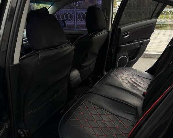 Черный Мазда 3, объемом двигателя 1.6 л и пробегом 253 тыс. км за 5400 $, фото 17 на Automoto.ua