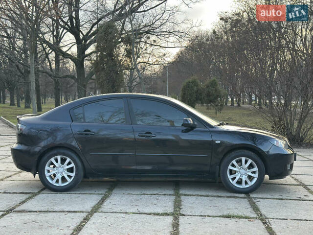 Чорний Мазда 3, об'ємом двигуна 1.6 л та пробігом 198 тис. км за 5499 $, фото 10 на Automoto.ua