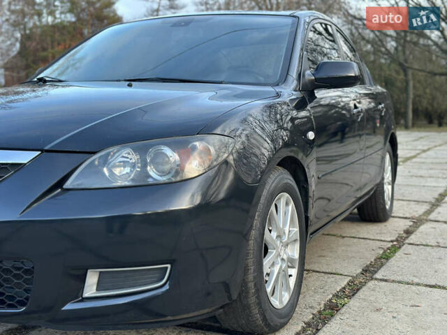 Чорний Мазда 3, об'ємом двигуна 1.6 л та пробігом 198 тис. км за 5499 $, фото 14 на Automoto.ua