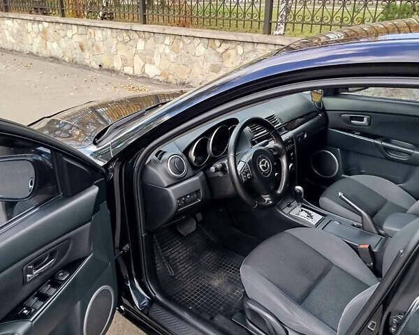 Черный Мазда 3, объемом двигателя 2 л и пробегом 199 тыс. км за 6800 $, фото 7 на Automoto.ua