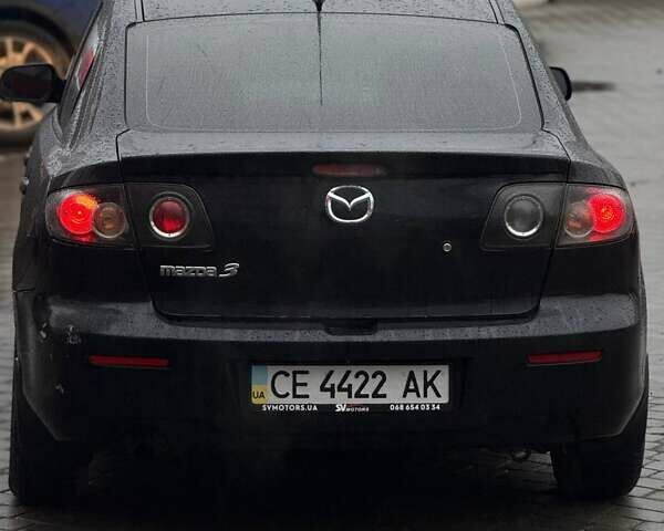 Черный Мазда 3, объемом двигателя 1.6 л и пробегом 89 тыс. км за 4800 $, фото 5 на Automoto.ua