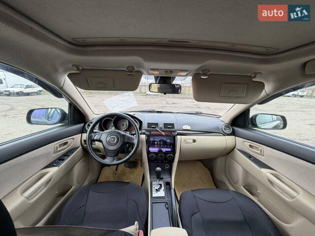 Черный Мазда 3, объемом двигателя 1.6 л и пробегом 325 тыс. км за 4250 $, фото 5 на Automoto.ua