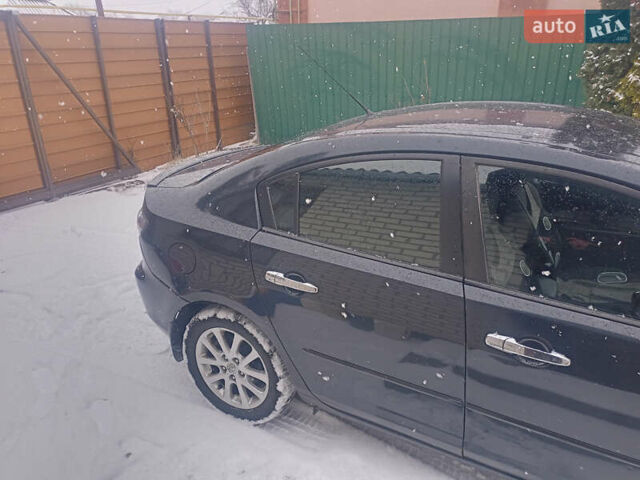 Черный Мазда 3, объемом двигателя 1.6 л и пробегом 200 тыс. км за 5800 $, фото 6 на Automoto.ua