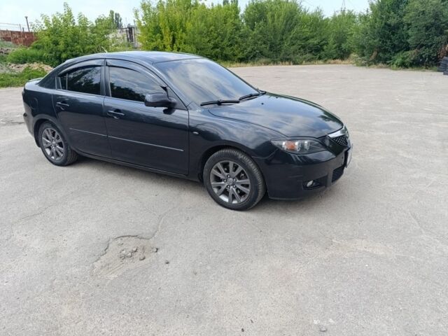 Черный Мазда 3, объемом двигателя 1.6 л и пробегом 202 тыс. км за 5200 $, фото 1 на Automoto.ua