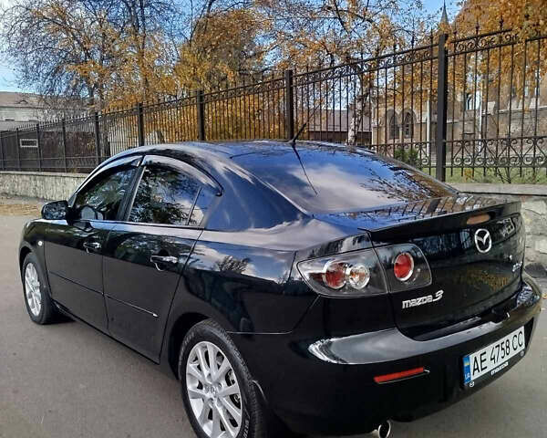 Черный Мазда 3, объемом двигателя 2 л и пробегом 199 тыс. км за 6800 $, фото 3 на Automoto.ua