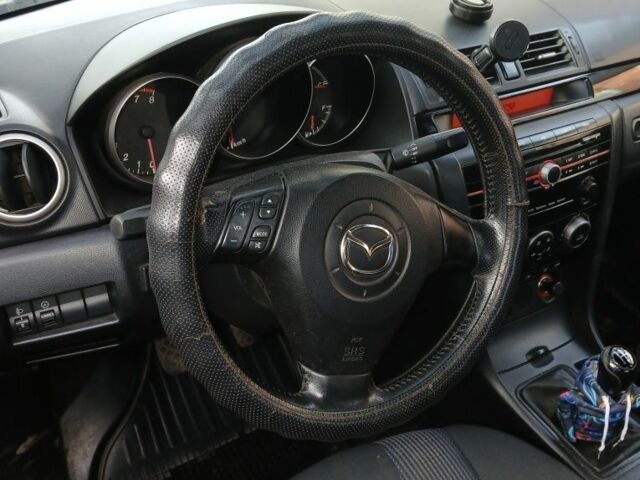Черный Мазда 3, объемом двигателя 1.6 л и пробегом 245 тыс. км за 3682 $, фото 7 на Automoto.ua