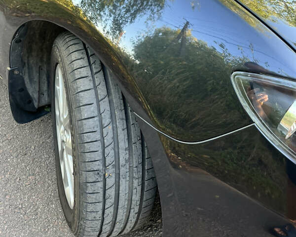 Чорний Мазда 3, об'ємом двигуна 2 л та пробігом 220 тис. км за 5500 $, фото 6 на Automoto.ua