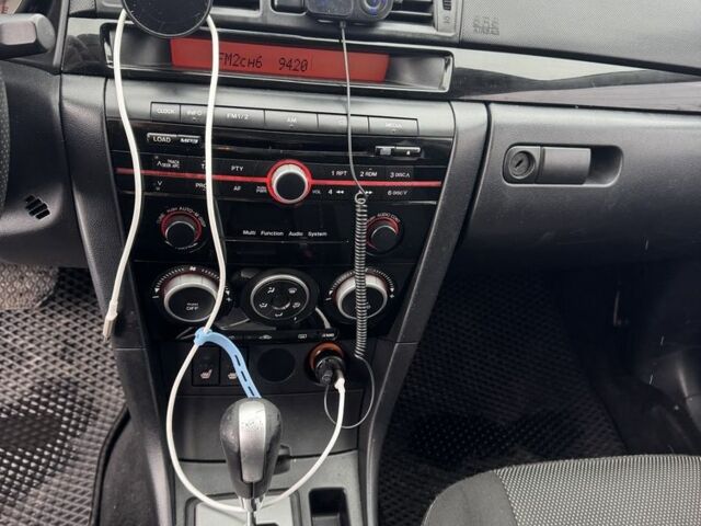 Чорний Мазда 3, об'ємом двигуна 1.6 л та пробігом 328 тис. км за 5700 $, фото 17 на Automoto.ua