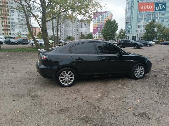 Черный Мазда 3, объемом двигателя 2 л и пробегом 221 тыс. км за 5700 $, фото 8 на Automoto.ua