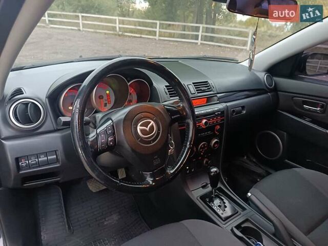 Черный Мазда 3, объемом двигателя 2 л и пробегом 221 тыс. км за 5700 $, фото 16 на Automoto.ua