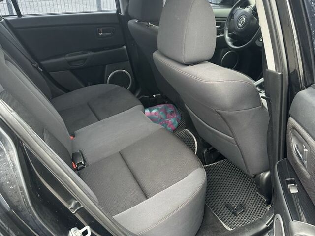 Черный Мазда 3, объемом двигателя 1.6 л и пробегом 135 тыс. км за 4900 $, фото 4 на Automoto.ua