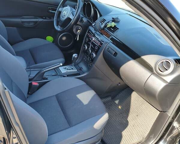 Черный Мазда 3, объемом двигателя 1.6 л и пробегом 228 тыс. км за 5800 $, фото 6 на Automoto.ua