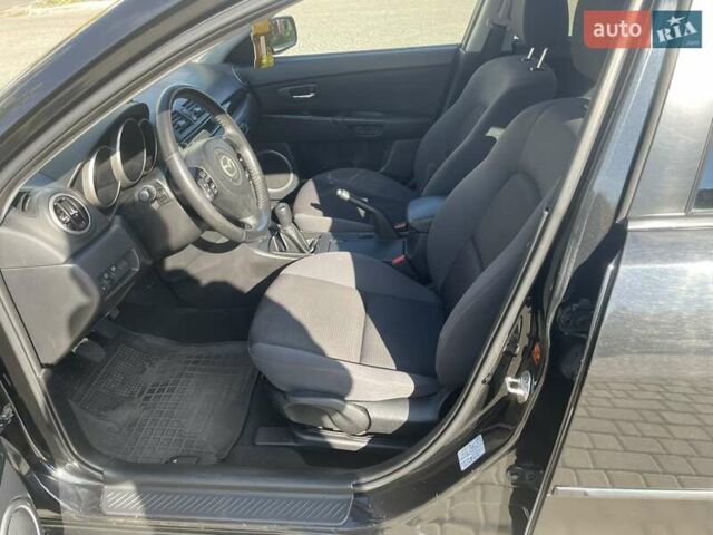 Черный Мазда 3, объемом двигателя 2 л и пробегом 175 тыс. км за 6000 $, фото 9 на Automoto.ua