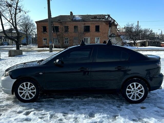 Чорний Мазда 3, об'ємом двигуна 2 л та пробігом 320 тис. км за 4500 $, фото 4 на Automoto.ua
