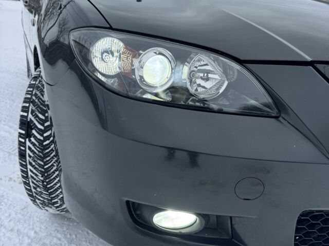 Чорний Мазда 3, об'ємом двигуна 1.6 л та пробігом 328 тис. км за 5700 $, фото 3 на Automoto.ua